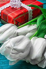 Image showing gift for your favorite background tulips