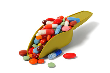 Image showing Scoop with pills