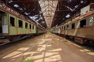 Image showing Cargo trains in old train depot