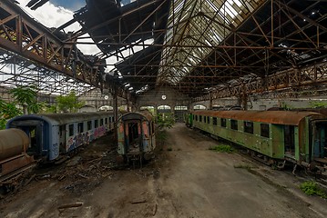 Image showing Cargo trains in old train depot