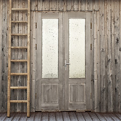 Image showing door with frosty window of plank house