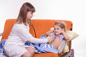 Image showing Pediatrician listening stethoscope baby breast