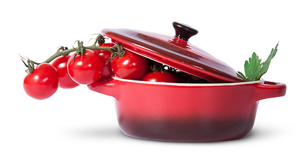 Image showing Cherry tomatoes and parsley in saucepan with lid