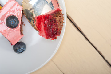 Image showing strawberry and mango mousse dessert cake