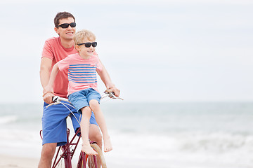 Image showing family biking