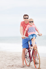 Image showing family biking