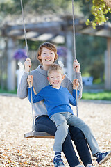 Image showing family at swings