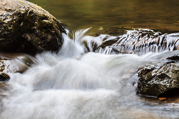 Image showing waterfall and rocks covered with moss