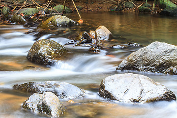 Image showing waterfall and rocks covered with moss