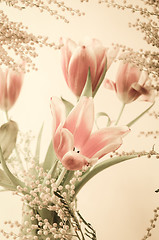 Image showing Spring bouquet with a mimosa and tulips