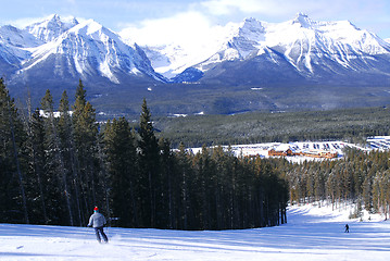 Image showing Skiing in mountains