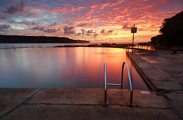 Image showing Red Summer Sunrise over Malabar Ocean Rock Pool Long Bay Austral