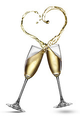 Image showing Champagne splash in shape of heart isolated 