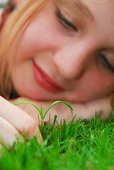 Image showing Girl and seedling