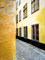 Image showing Bright yellow buildings in the old center of Stockholm