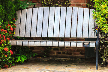 Image showing Old Wooden Bench in the garden