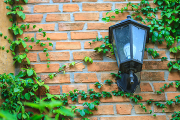 Image showing old lamp on the wall 