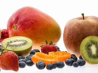 Image showing Halved Apricot And Kiwi Fruit On White Background