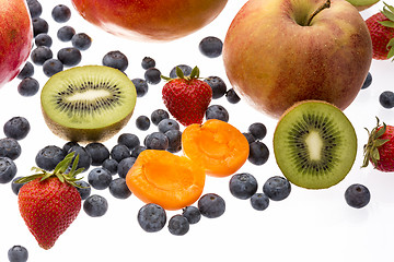 Image showing Halved Apricot And Kiwi Amidst Other Fruit