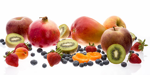 Image showing Mix Of Tropical And Nontropical Fruit On White