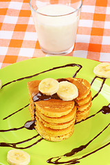 Image showing Heart shaped pancakes with chocolate and banana