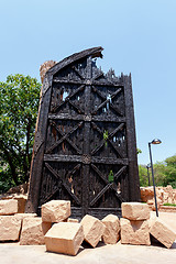 Image showing Gigantic door near bridge in famous Lost City