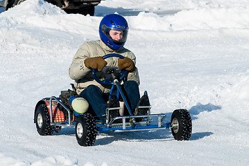 Image showing Man is driving Go-kart with speed on karting track