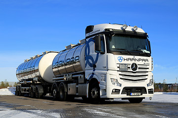 Image showing White Mercedes-Benz Actros Tank Truck on Icy Yard