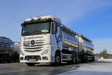 Image showing White Mercedes-Benz Actros Tank Truck on Icy Yard