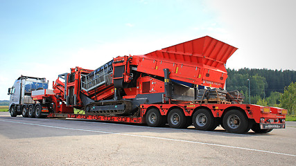 Image showing Volvo FH Hauls a Heavy Load on Double Drop Deck Trailer