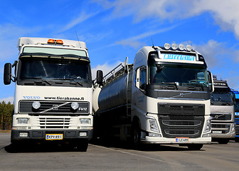 Image showing Different Generations of Volvo FH Truck Parked in a Row