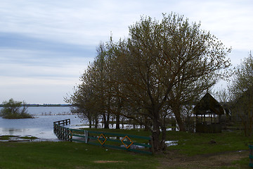 Image showing Spring panorama with the river in flood cloudy day