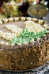 Image showing Walnut cake with butter cream.