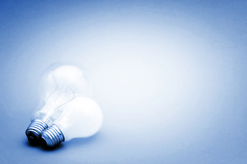 Image showing Background with lit lightbulb