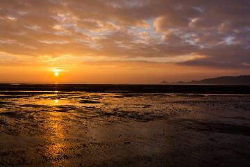 Image showing Sunrise over Mumbles mudflats