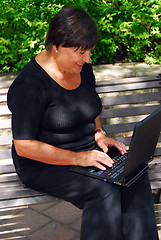 Image showing Mature woman computer