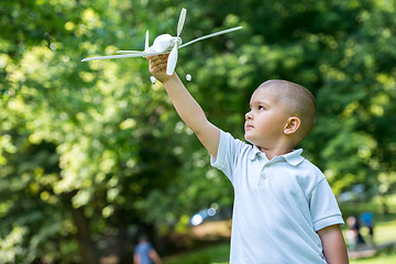 Image showing boy with airpane toy