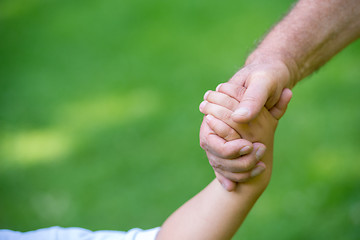 Image showing grandfather and child have fun  in park