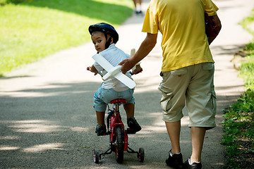 Image showing grandfather and child have fun  in park