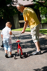 Image showing grandfather and child have fun  in park