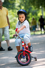 Image showing grandfather and child have fun  in park