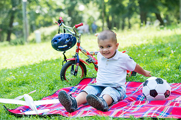 Image showing boy with airpane toy