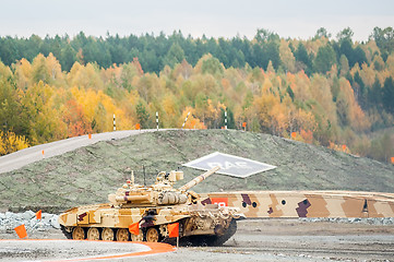 Image showing Modernized tank T-90S in action