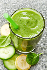 Image showing glass of banana, cucumber and spinach smoothie