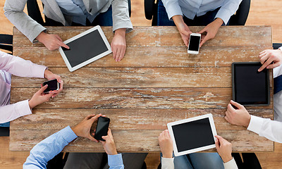 Image showing business team with smartphones and tablet pc