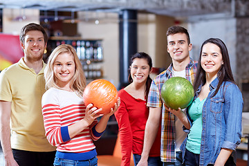 Image showing happy friends in bowling club