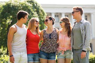 Image showing group of smiling friends outdoors