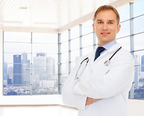 Image showing smiling male doctor with stethoscope