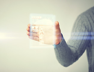 Image showing man showing tablet pc with news