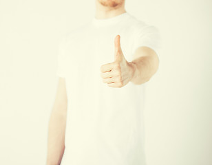 Image showing man showing thumbs up